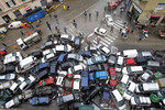 5 ноября. Перевернутые машины в центре Генуи после шторма, обрушившегося на Италию.
