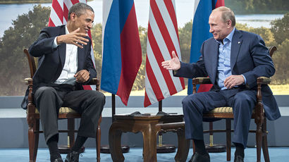 Президент России Владимир Путин (справа) и президент США Барак Обама во время встречи в рамках...