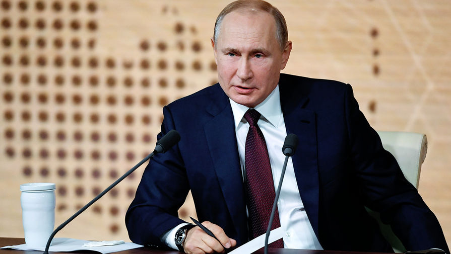 Президент России Владимир Путин во время большой пресс-конференции в Центре международной торговли в Москве, 19 декабря 2019 года
