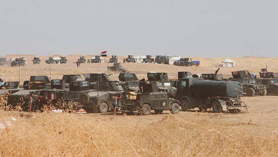Военные автомобили иракских сил безопасности, подготовка к&nbsp;операции, 15 октября 2016 года