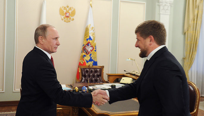 2014 год. Президент России Владимир Путин и глава Чеченской Республики Рамзан Кадыров во время...