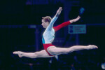 Первое олимпийское золото Хоркина завоевала в 1996 году в Атланте.
<br>
На фото: Светлана Хоркина, завоевавшая золотую медаль в индивидуальных соревнованиях на брусьях, во время соревнований по спортивной гимнастике на XXVI летних Олимпийских играх в США, 1996 год