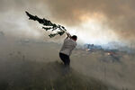 Тушение лесных пожаров в центральной Португалии, 12 июля 2022 года
