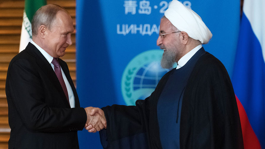 Президент России Владимир Путин и президент Ирана Хасан Роухани во время встречи, 2018 год