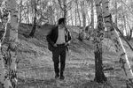 Поэт Роберт Рождественский на прогулке в лесу поселка Переделкино, 1980 год