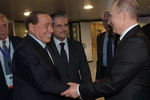 Президент России Владимир Путин и Сильвио Берлускони во время встречи в международном аэропорту «Фьюмичино» в Риме, 5 июля 2019 года