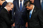 Президент России Владимир Путин и премьер-министр Японии Синдзо Абэ на полях саммита G20 в Осаке, 28 июня 2019 года